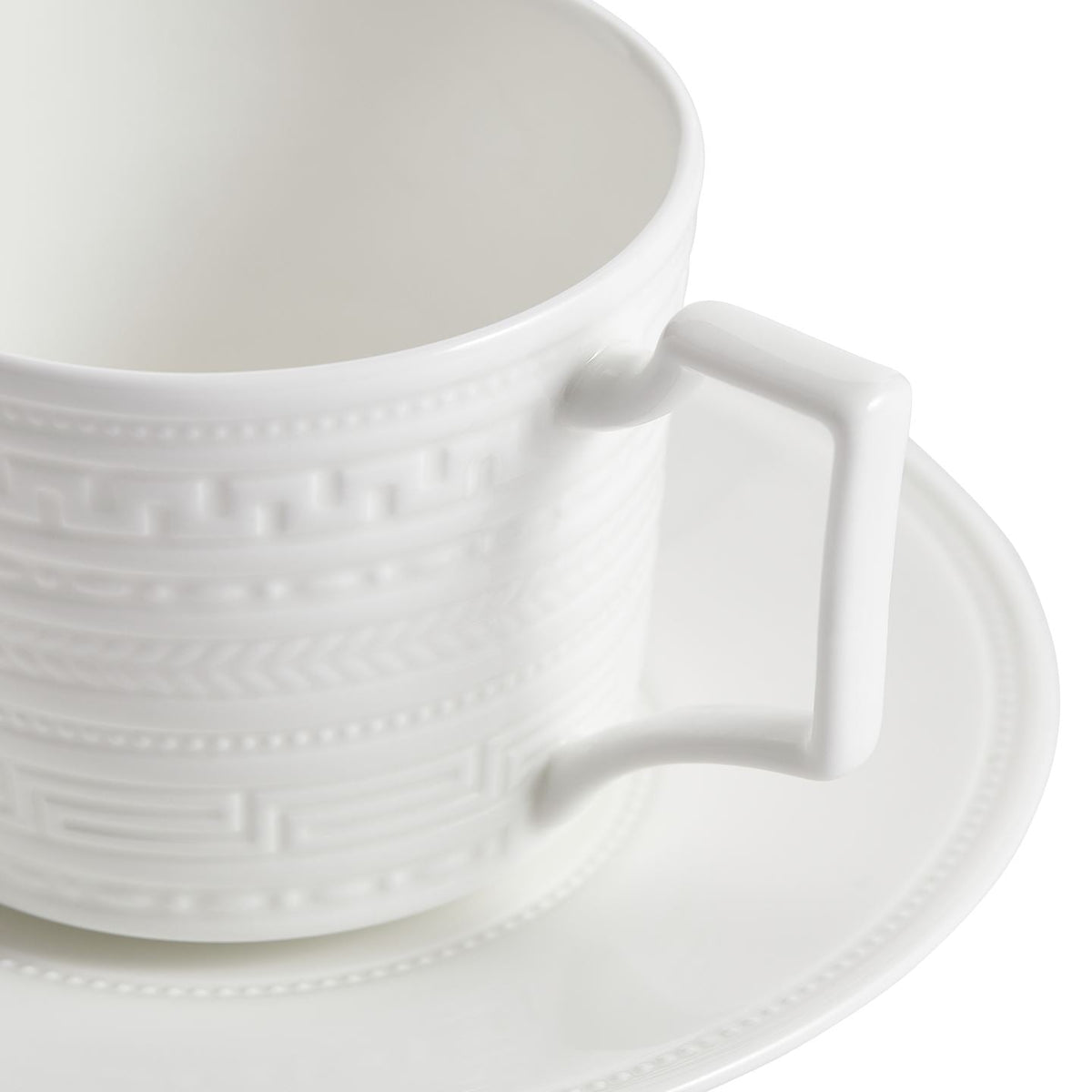 Intaglio Teacup and Saucer